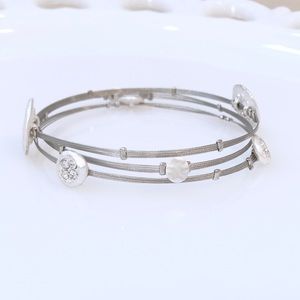 Silver wire bangle bracelet set with sparkly discs